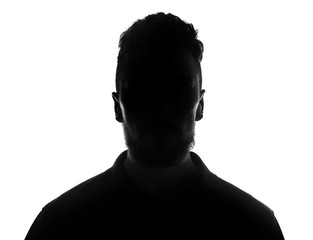 Silhouette of male person over white