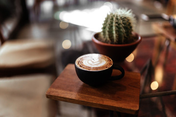 Wall Mural - cup of coffee on table in cafe, vintage style copy space