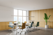 Wooden Office Corner With Colorful Chairs