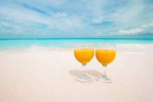 Two Tasty Cocktails On Tropical White Beach