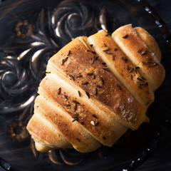 Wall Mural - Mini croissants filled with cheese on wooden table