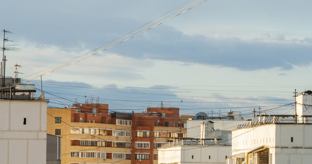 Troitsk city house rooftops and wires. Urban russian background with space for copy