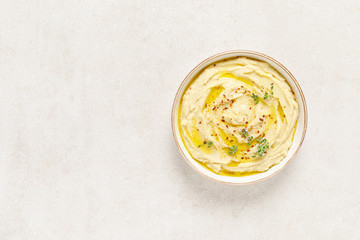 Wall Mural - Hummus, mashed chickpeas with lemon, spices and herbs