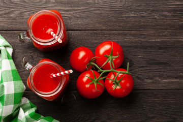 Wall Mural - Fresh tomato juice and ripe tomatoes