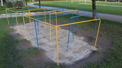 Wall Mural - horizontal bars in kindergarten yard