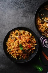 Wall Mural - Homemade indian Vegetable / veg biryani with mixed veggies served with raita