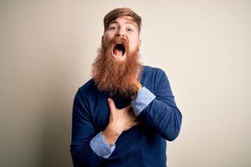 Sticker - Handsome Irish redhead business man with beard standing over isolated background shouting and suffocate because painful strangle. Health problem. Asphyxiate and suicide concept.