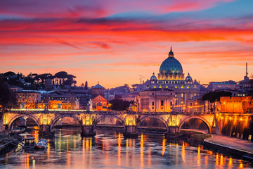 Fototapete - Night view of St. Peter's cathedral and Tiber river in Rome, Italy