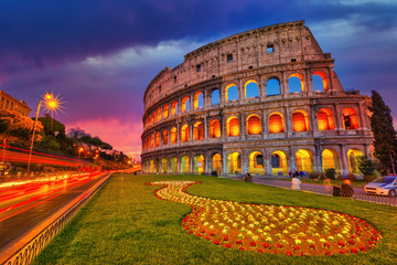 Fototapete - Colosseum at dusk in Rome, Italy
