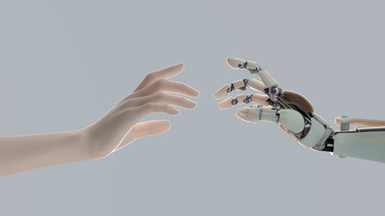 hands of a robot and a man tend to one another