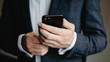 © Andrii  Kucheruk - businessman using cell phone