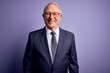 © Krakenimages.com - Grey haired senior business man wearing glasses and elegant suit and tie over purple background with a happy and cool smile on face. Lucky person.