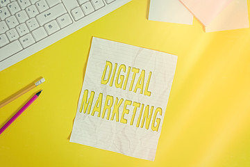 Fototapete - Word writing text Digital Marketing. Business photo showcasing market products or services using technologies on Internet Copy space on notebook above yellow background with pc keyboard on the table