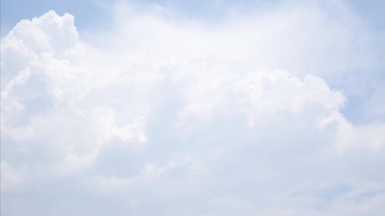 Wall Mural - 4k Time lapse video blue sky with fluffy white clouds moving during the day time