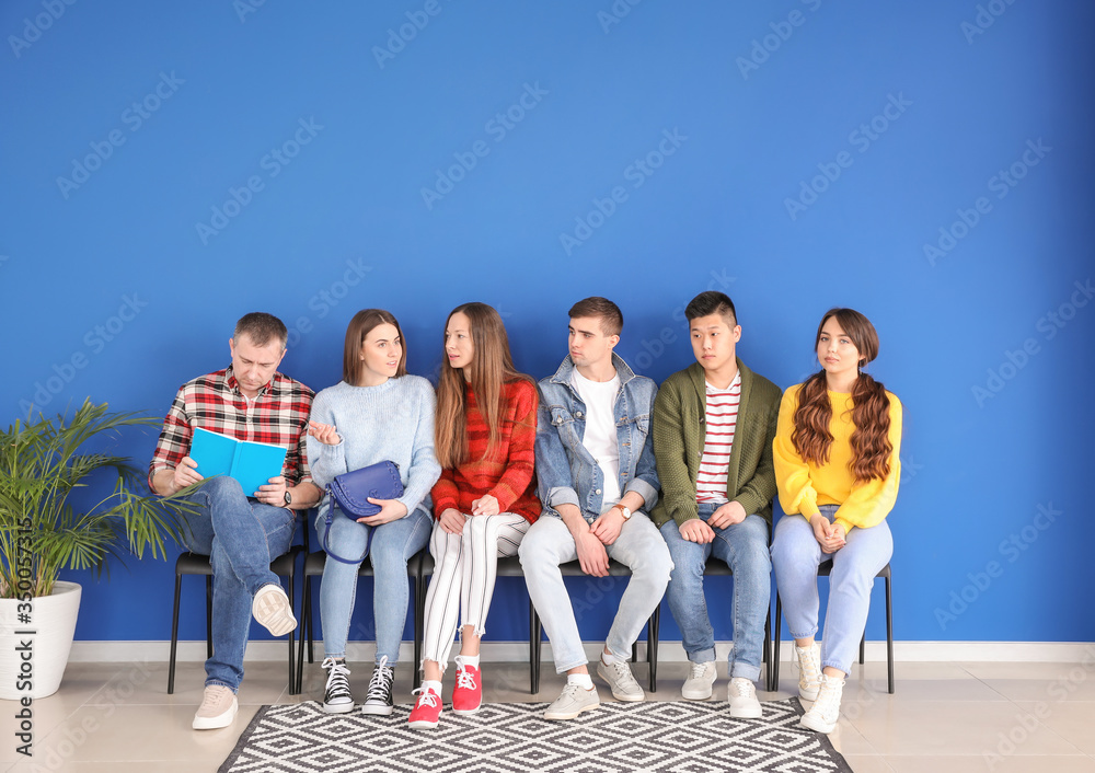 People waiting in line indoors