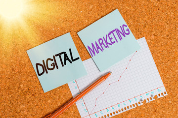 Fototapete - Text sign showing Digital Marketing. Business photo text market products or services using technologies on Internet Desk notebook paper office cardboard paperboard study supplies table chart