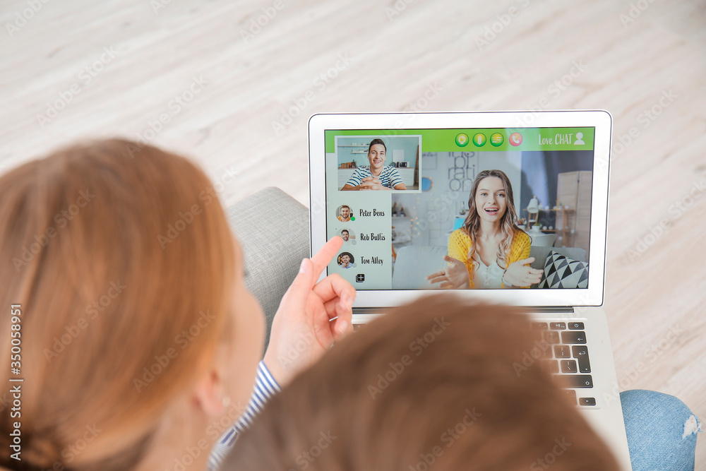 Couple video chatting at home