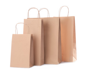  Paper shopping bags on white background