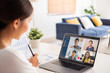 © Nattakorn - Young Asian businesswoman work at home and virtual video conference meeting with colleagues business people, online working, video call due to social distancing at home office