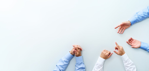 Aufkleber - Top view of business meeting. Three men discussing at white table.