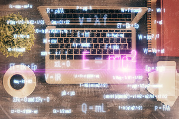 Aufkleber - Physics and math theme hologram with formula drawings over computer on the desktop background. Top view. Multi exposure. Concept of education.