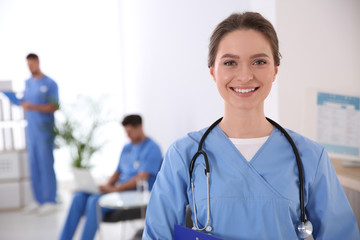 Sticker - Portrait of female doctor in modern clinic