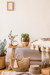 Wall Mural - stylish composition of living room interior with mock up frame, wooden bench, pillow, plaid, rattan 