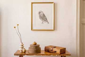Wall Mural - stylish concept at living room interior with gold mock up frame, wooden bench, boxes, dried flowers 