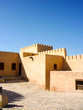 Amazing desert landscape and scenery with rocks and sand and Arabian architecture Bukha Fort near Khasab in Oman as popular cruise and tourist destination