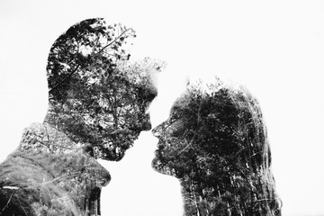 Multiple exposure of man and woman in nature.