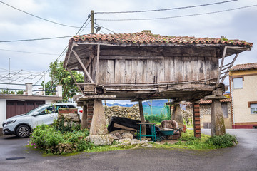 Wall Mural - Horreo, historic wooden granary on a pillars in Guerres, small village in Asturias region, Spain