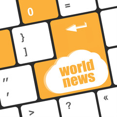Poster - words world news on computer keyboard key