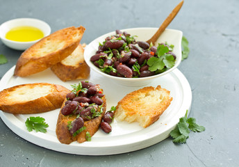 Sticker - Bruschetta with Bean Stew. Selective focus