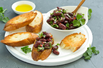 Sticker - Bruschetta with Bean Stew. Selective focus