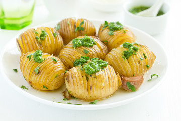 Wall Mural - baked potato accordion with parsley.