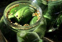 Canning Homemade Pickles In Jars With Brine And Spices, A Fermented Food