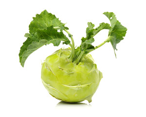 Wall Mural - Fresh kohlrabi with green leaves on isolated white backround