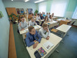 © Довидович Михаил - Students during the lesson are sitting at their desks. Russian school.