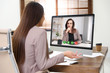 © New Africa - Woman using video chat for online job interview in office