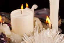 Burning Candles With Amethyst And Quartz Crystals And Agate Stone.