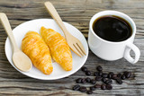 Fototapeta Mapy - Fresh butter croissants with coffee
