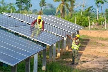 Poster - Group of engineer checking solar panel in routine operation at solar power plant,Operation and maintenance in solar power plant,solar power plant to innovation of green energy for life.