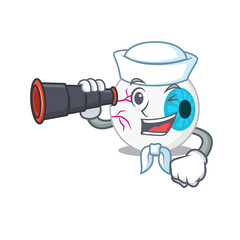 Wall Mural - A cartoon picture of eyeball Sailor using binocular