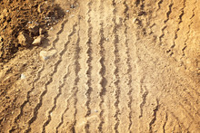 Tracks Of Cars On The Sand In The Desert.