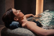 © JarosawMicha - Conception of bodycare. Beauty and body care. View of a young woman enjoying Jacuzzi. Sensual young woman relaxing in spa jacuzzi.