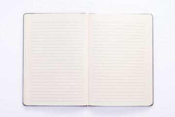 Canvas Print - notepad or notebook paper at white background