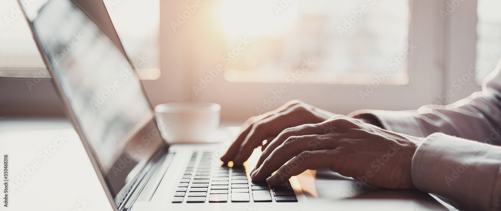Man hands typing on computer keyboard closeup, businessman or student using laptop at home, panoramic banner, online learning, internet marketing, working from home, office workplace freelance concept - obrazy, fototapety, plakaty 