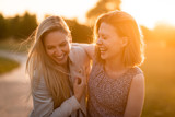 Fototapeta Miasto - Friends sharing moment of joy together