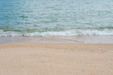 Fototapeta Morze - Background of the beach with sea wave