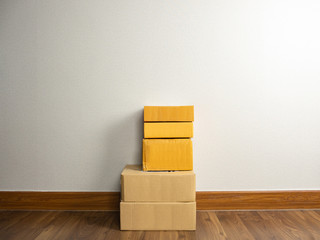 Empty parcel boxes stacking vertically on empty floor